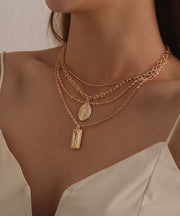 Goldtone Layered Charm & Pendant Necklace